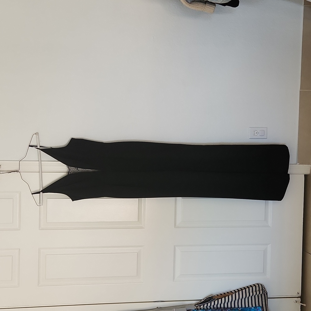 BLACK Wide Leg Open Back Jumpsuit with Lace V Neck Detail. Size Medium
